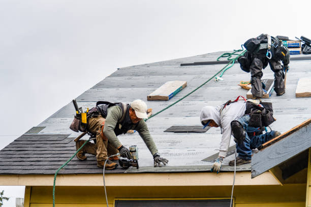 Professional Roofing technician working in De Witt, NY